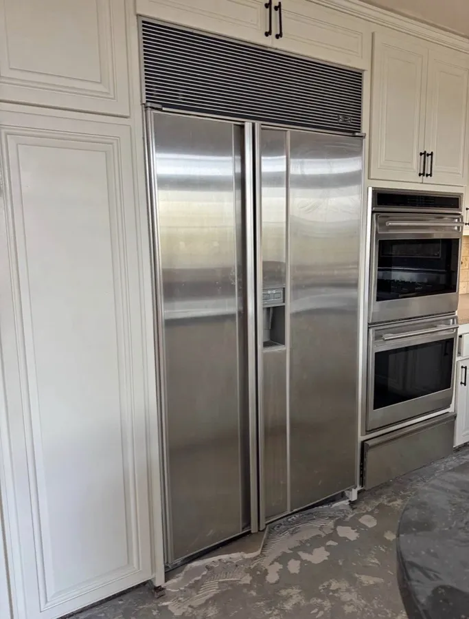 Sub-Zero side-by-side refrigerator with dispenser